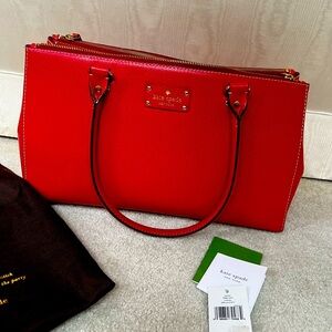 KATE SPADE
Beautiful deep red leather.